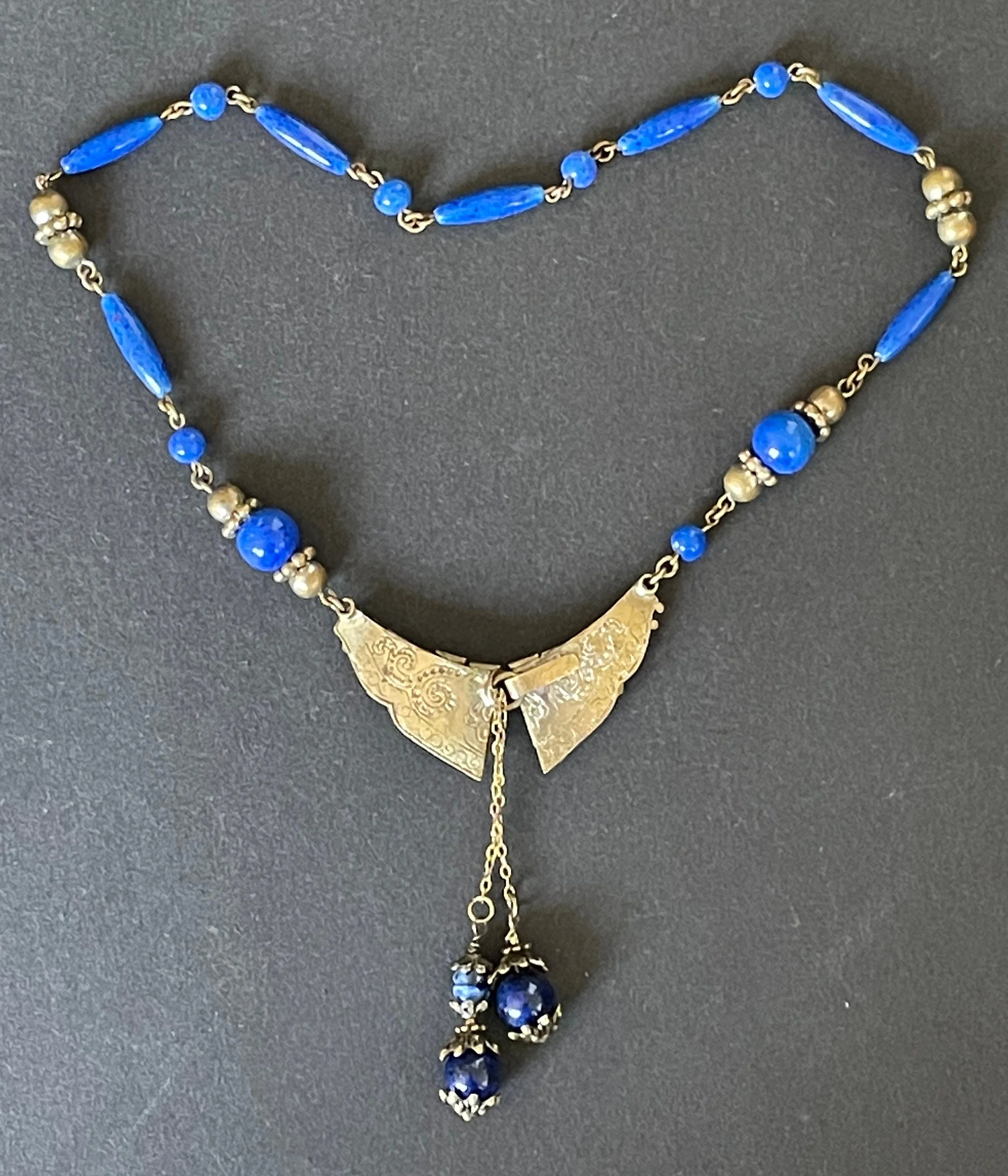 Vintage Art Deco Czech Max Neiger Brothers style lapis lazuli glass and gold tone negligee necklace, front fastening
